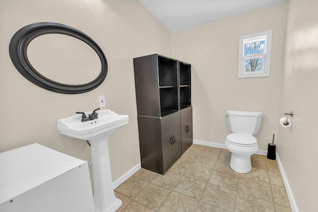 bathroom featuring toilet