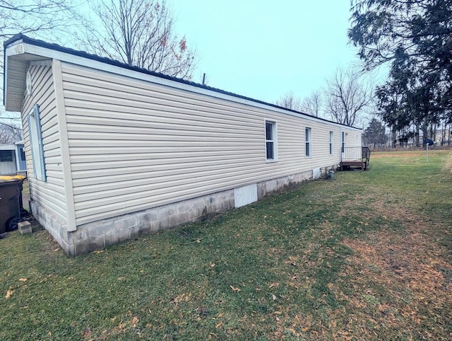 view of home's exterior featuring a lawn