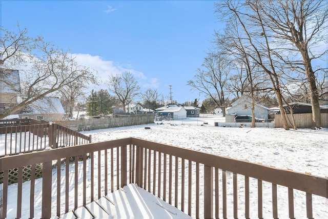 view of snow covered deck