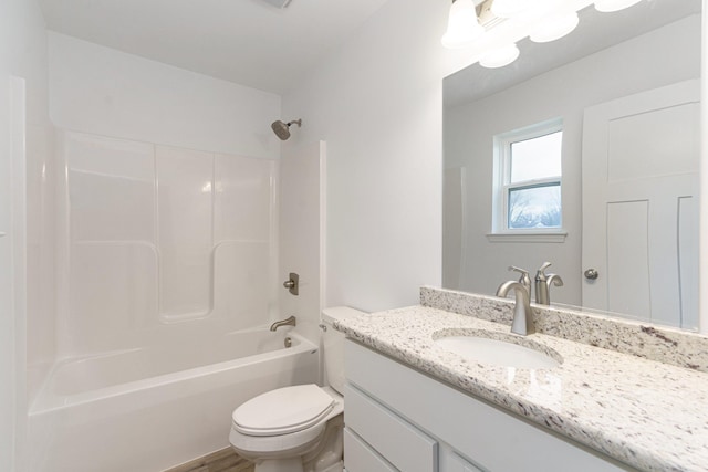 full bathroom featuring vanity, shower / bathing tub combination, and toilet