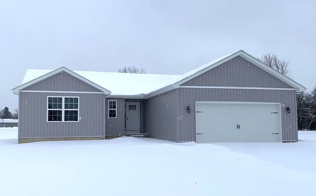 ranch-style home with a garage