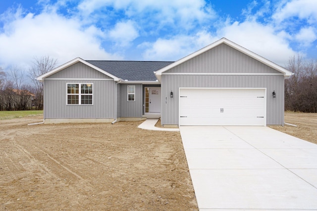 ranch-style house featuring a garage