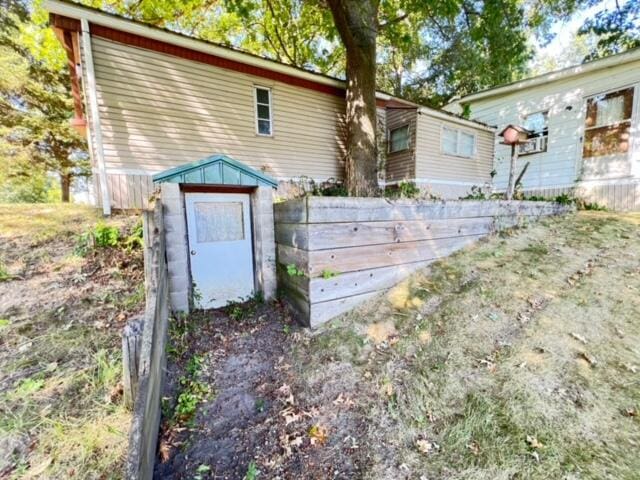 exterior space featuring a storage shed