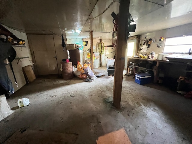 interior space with a workshop area and concrete flooring