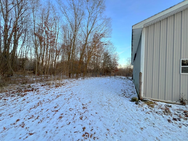 view of yard covered in snow