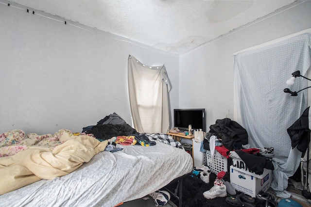 bedroom featuring a textured ceiling