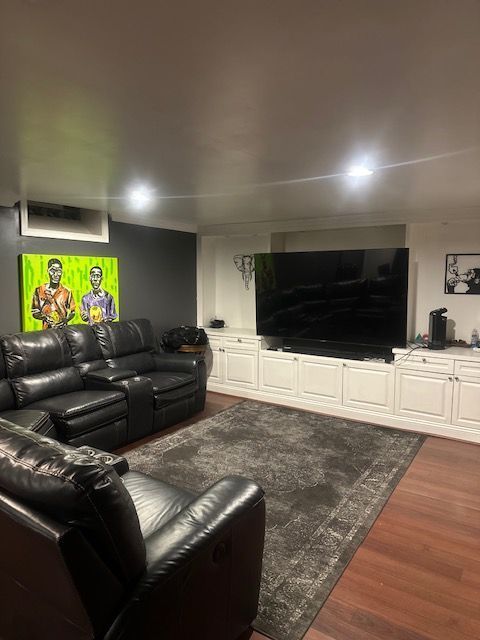 living room with dark wood-type flooring