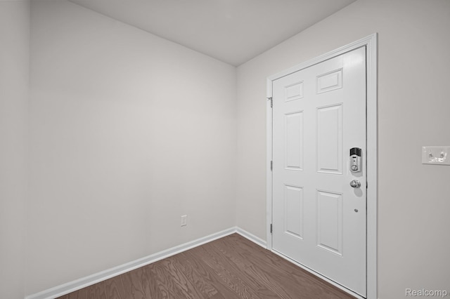 14213 Old Oak Trl, Van Buren, MI 48111 - foyer with dark wood-style flooring and baseboards