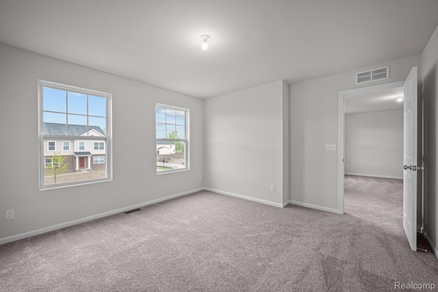 14213 Old Oak Trl, Van Buren, MI 48111 - carpeted empty room featuring baseboards