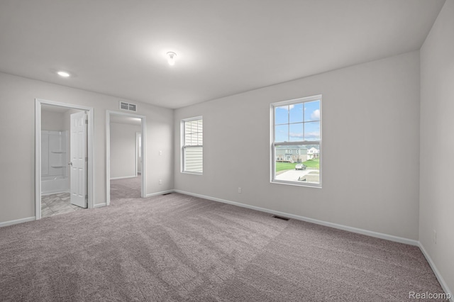 14213 Old Oak Trl, Van Buren, MI 48111 - unfurnished bedroom with carpet, baseboards, and connected bathroom
