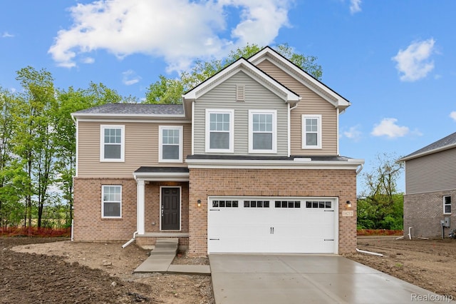 14213 Old Oak Trl, Van Buren, MI 48111 - traditional home with brick siding, an attached garage, and concrete driveway