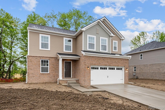14213 Old Oak Trl, Van Buren, MI 48111 - traditional-style home featuring an attached garage, brick siding, and driveway