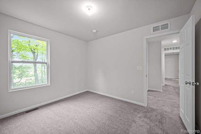 14213 Old Oak Trl, Van Buren, MI 48111 - spare room featuring carpet and baseboards