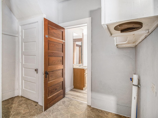 bathroom featuring vanity and wood-type flooring