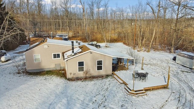 view of snow covered property