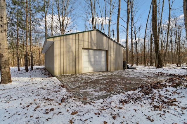 view of snow covered garage