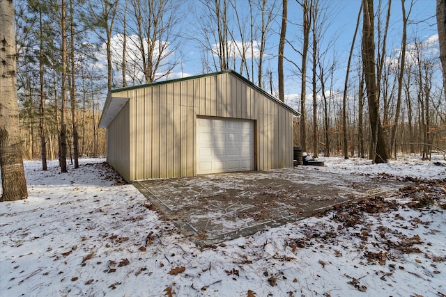 4643 Waldon Rd, Clarkston, MI 48348 - snow covered garage featuring a detached garage