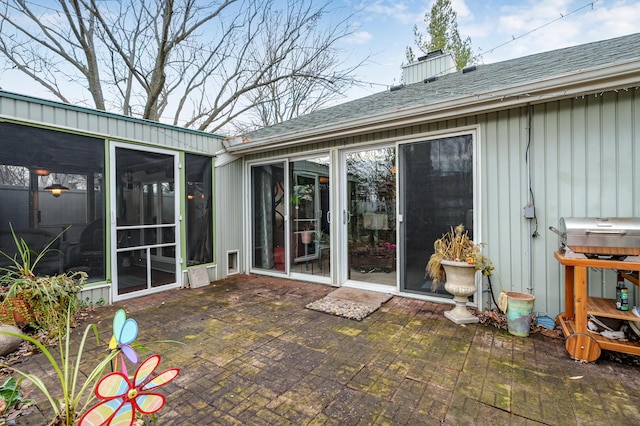 exterior space featuring a sunroom