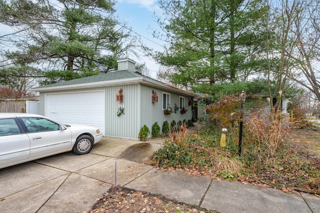 view of property exterior featuring a garage