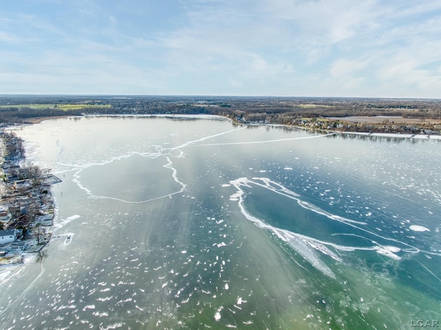 birds eye view of property featuring a water view