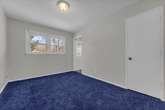 view of carpeted spare room