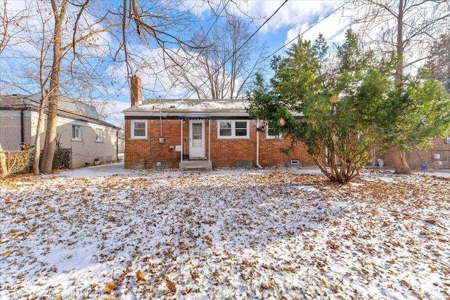 view of snow covered property