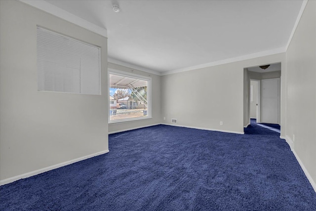 carpeted empty room with crown molding