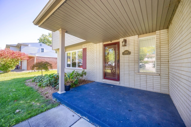 property entrance featuring a porch