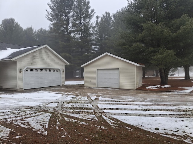 view of snow covered garage