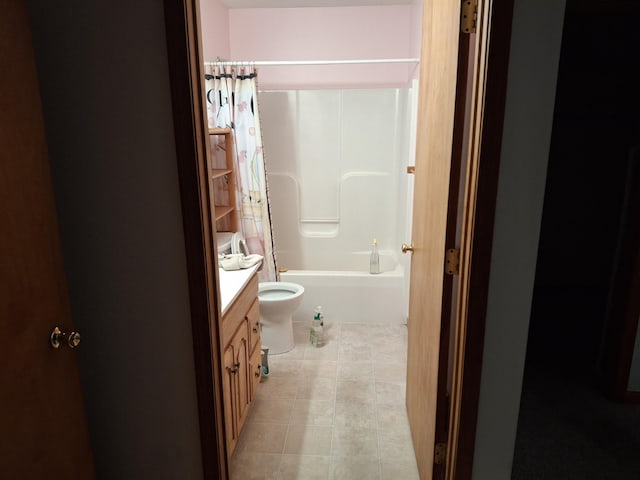 full bathroom with tile patterned floors, vanity, shower / bath combo, and toilet