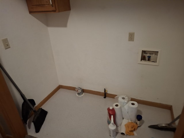 washroom featuring cabinets and washer hookup