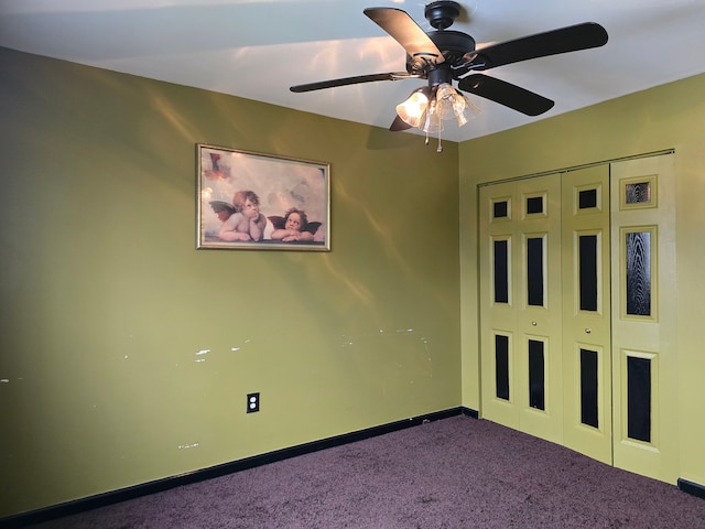 unfurnished bedroom featuring carpet flooring, ceiling fan, and a closet