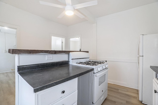 kitchen featuring white cabinets, ceiling fan, light hardwood / wood-style floors, and white appliances