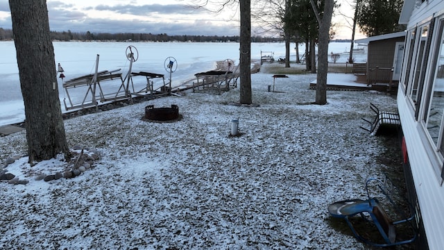 view of yard covered in snow