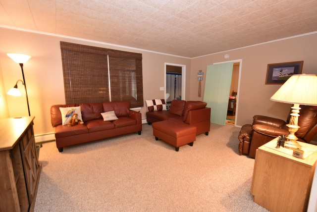 living room with ornamental molding, a baseboard heating unit, and light colored carpet