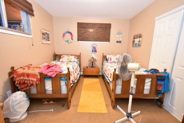 bedroom with light hardwood / wood-style flooring