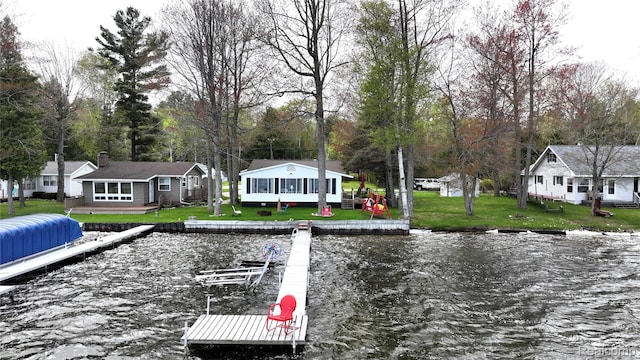 4141 Buena Vista Dr, Greenbush, MI 48738 - dock area with a water view and a lawn