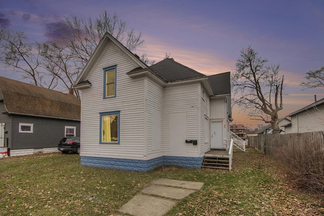596 Superior St, Benton Harbor, MI 49022 - view of property exterior with a shingled roof