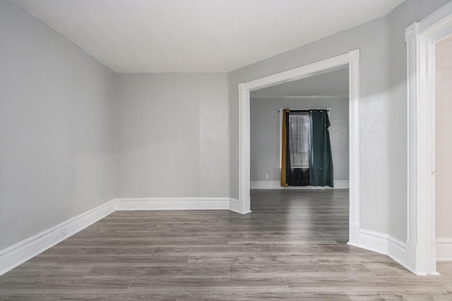 596 Superior St, Benton Harbor, MI 49022 - spare room with wood finished floors and baseboards