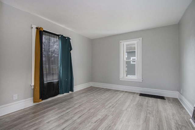 596 Superior St, Benton Harbor, MI 49022 - empty room featuring wood finished floors