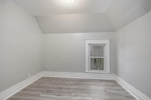 596 Superior St, Benton Harbor, MI 49022 - bonus room with lofted ceiling and wood finished floors