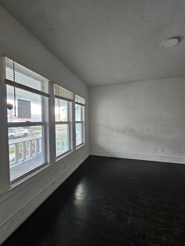 empty room with a textured ceiling