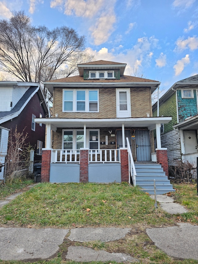 view of front of home featuring covered porch