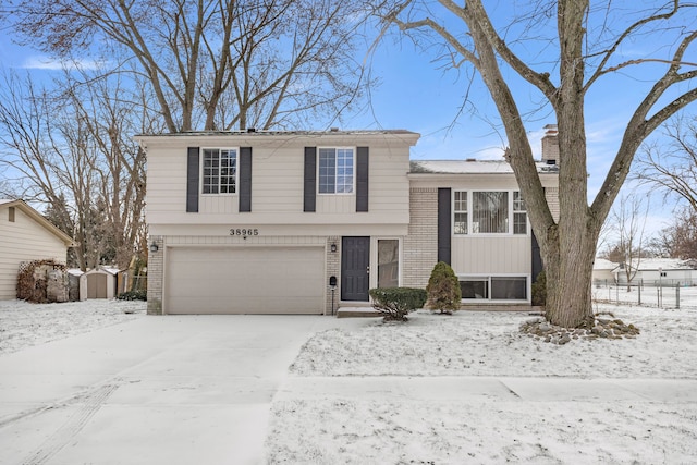 split level home featuring a garage