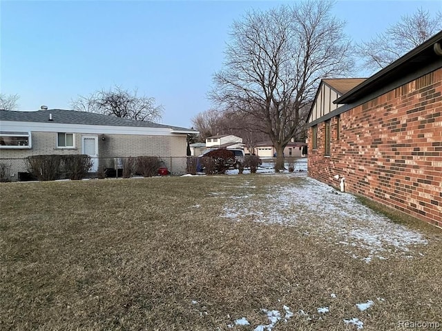 view of yard covered in snow