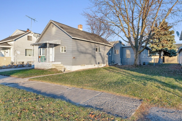 exterior space with a front yard