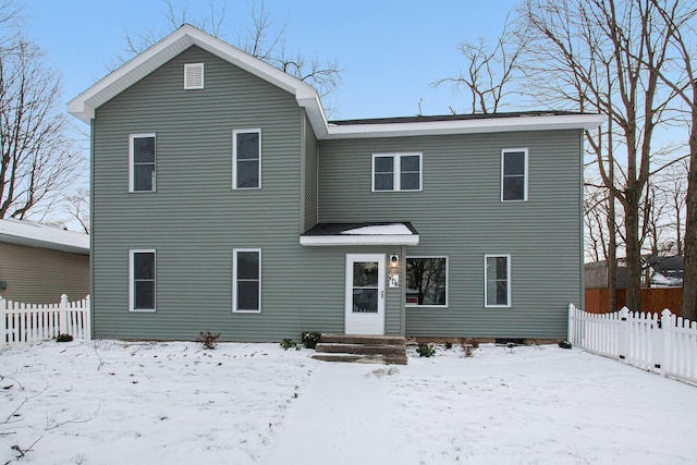 view of snow covered property