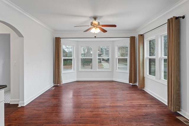 unfurnished sunroom with ceiling fan