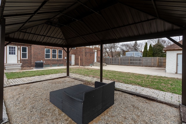 exterior space with a gazebo and central AC unit