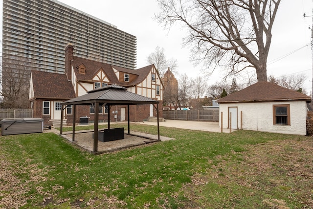 view of yard featuring a gazebo, central air condition unit, a patio, and a hot tub